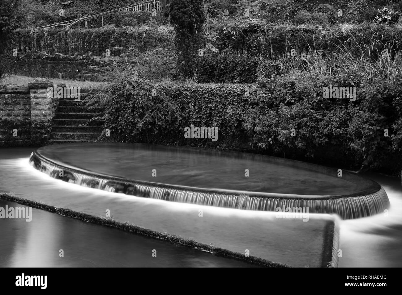 Long exposure of an ornamental waterfall in Cheddar village in Somerset Stock Photo