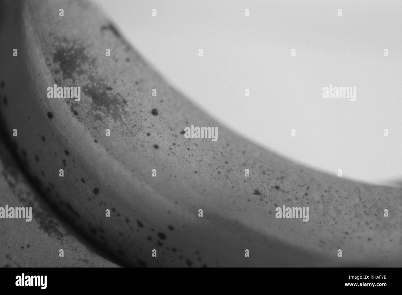 Closeup photo of bananas. Taken with macro objective to show all the smallest details. The bananas are very ripe. Beautiful black & white image. Stock Photo