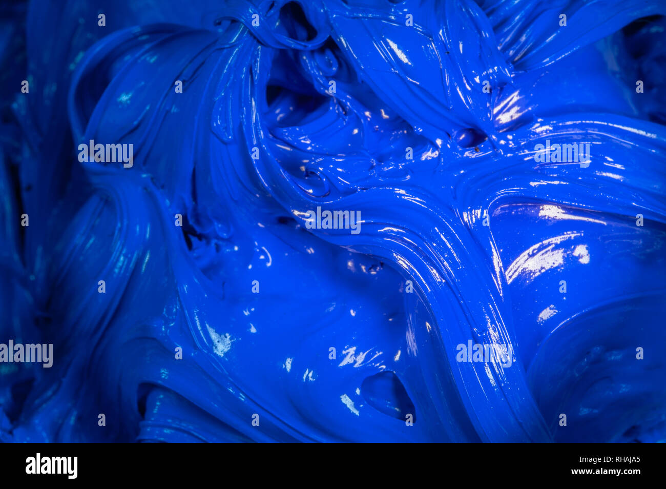 close up blue color of oil paint.ink of screen printing for print on ...