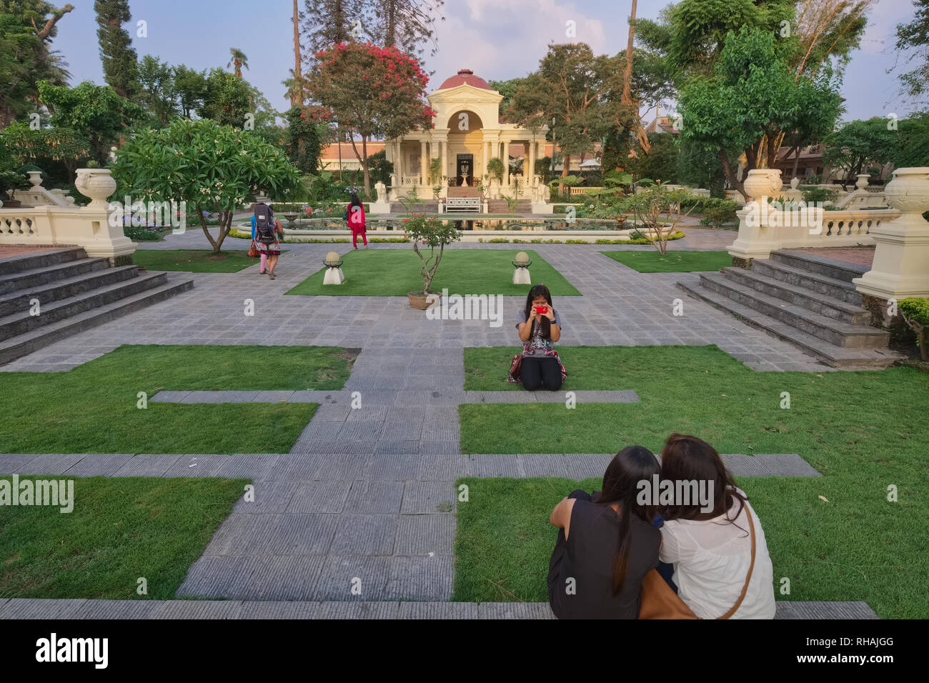 Visitors taking photos at the Garden of Dreams in Thamel, Kathmandu, Nepal Stock Photo