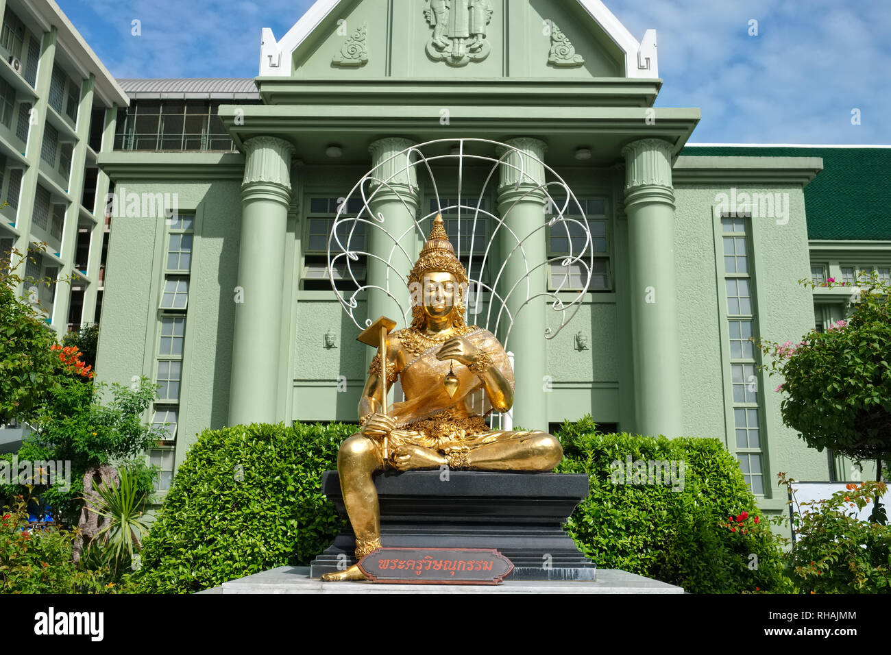 A statue of god Vishnu as patron of crafts at Poh Chang Arts & Crafts School in Bangkok, Thailand, attached to Rajmangala University of Technology Stock Photo