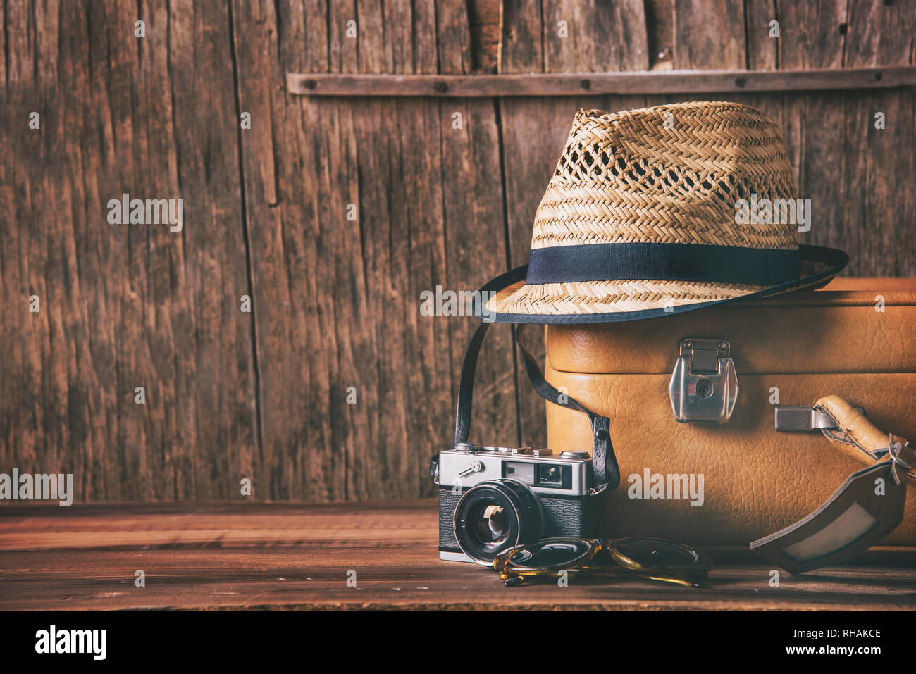 retro camera on wooden background still 