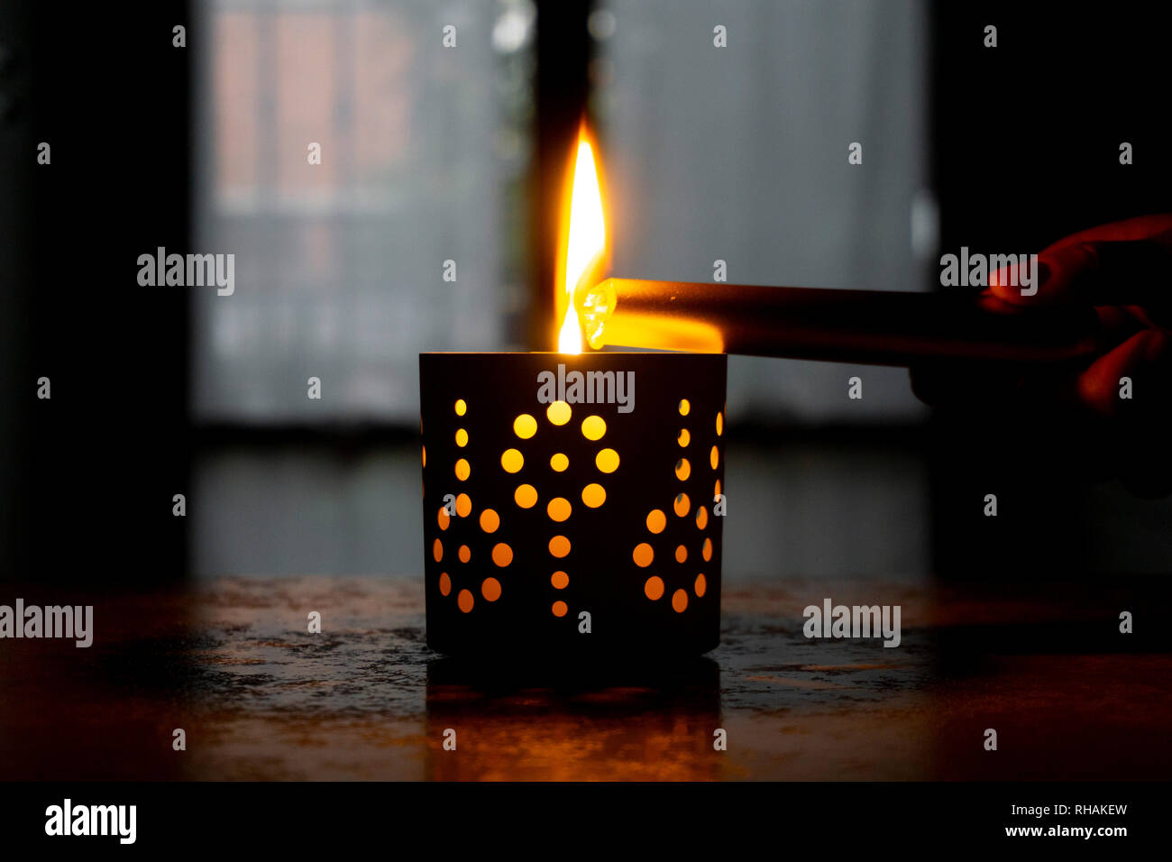 Candle burning at night. Candle light on black background Stock Photo