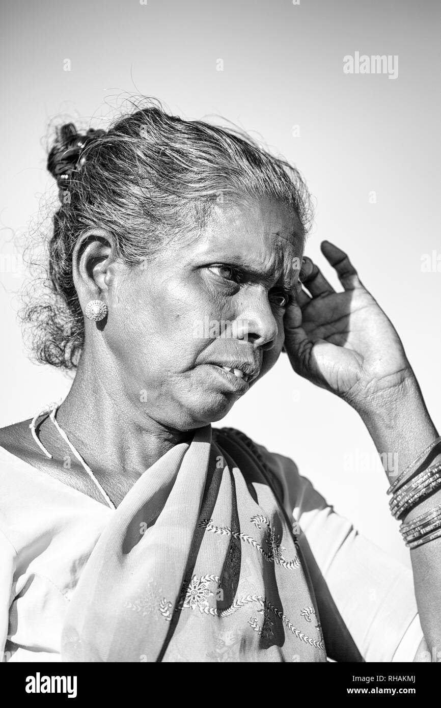 PUDUCHERRY, INDIA - DECEMBER Circa, 2018. Unidentified portrait close up of old face indian woman outdoor in village, very serious sad. Black and whit Stock Photo
