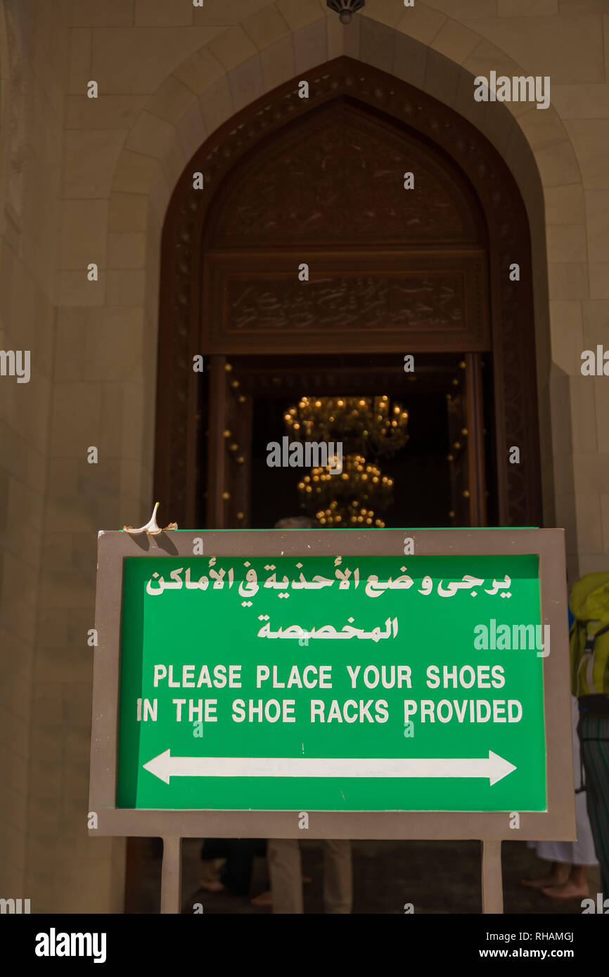 Notice board to store your shoes outside the Muscat Grand Mosque (Oman) Stock Photo