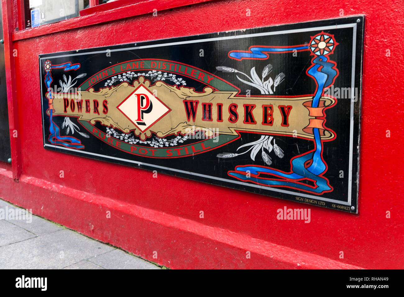 Powers Whiskey artwork advertising on the side of Temple Bar pub in Dublin Ireland Stock Photo