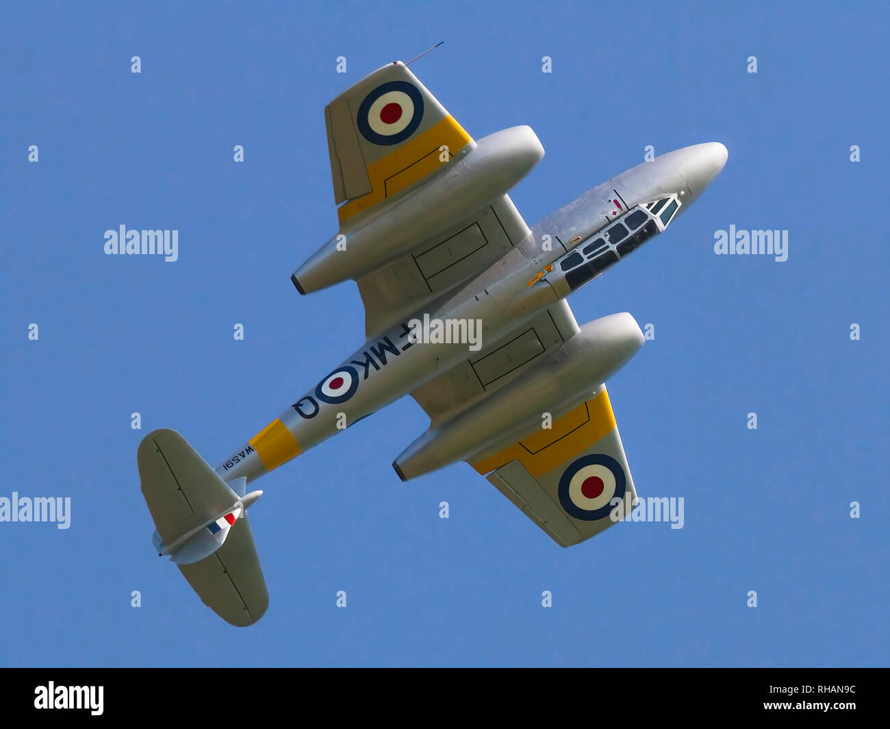 1949 Meteor T.7 WA591 seen inverted as it goes over the 'hump' of a barrell roll in 2012. Stock Photo