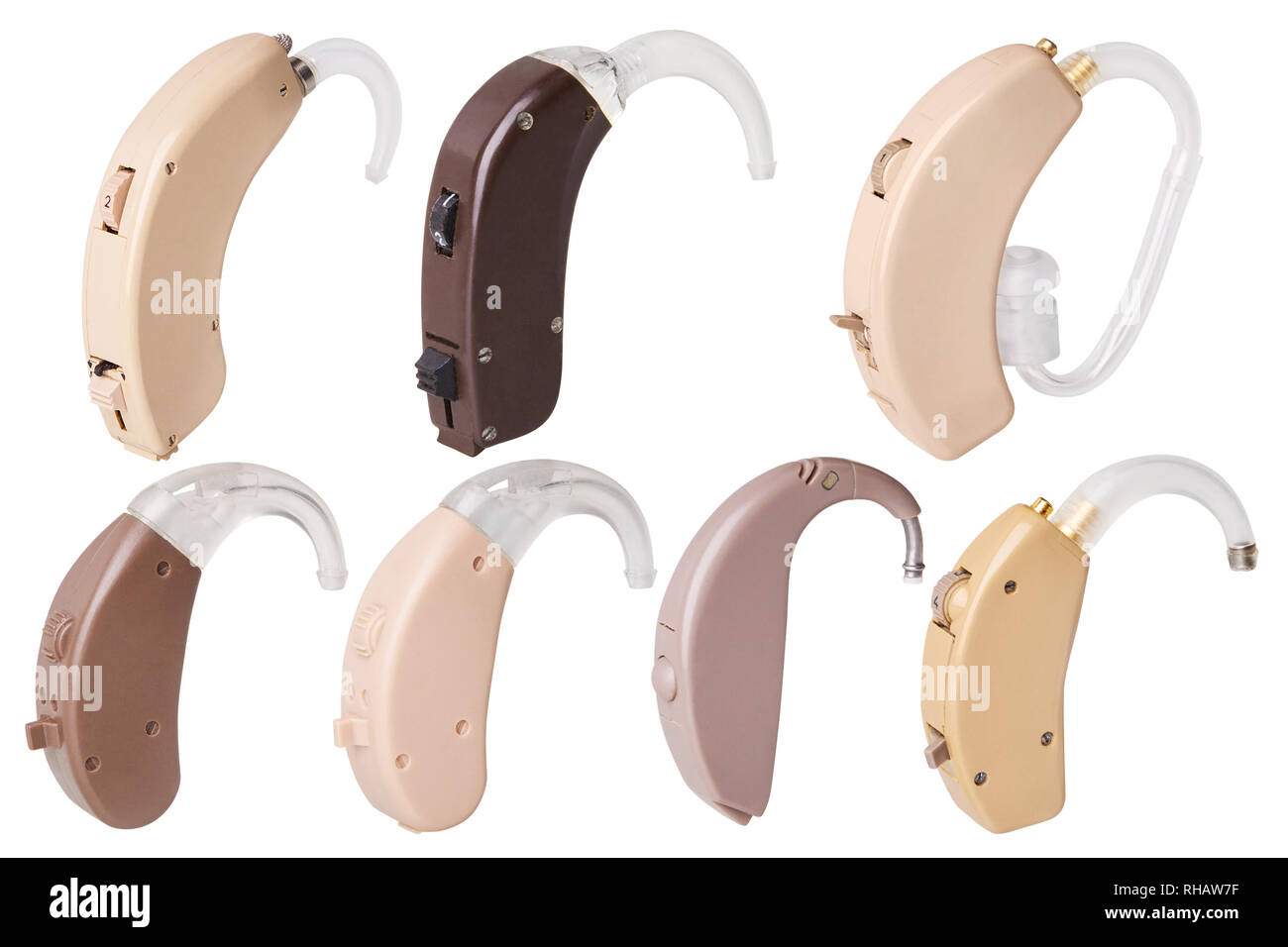 Set of old hearing aids on white background isolated, alternative to