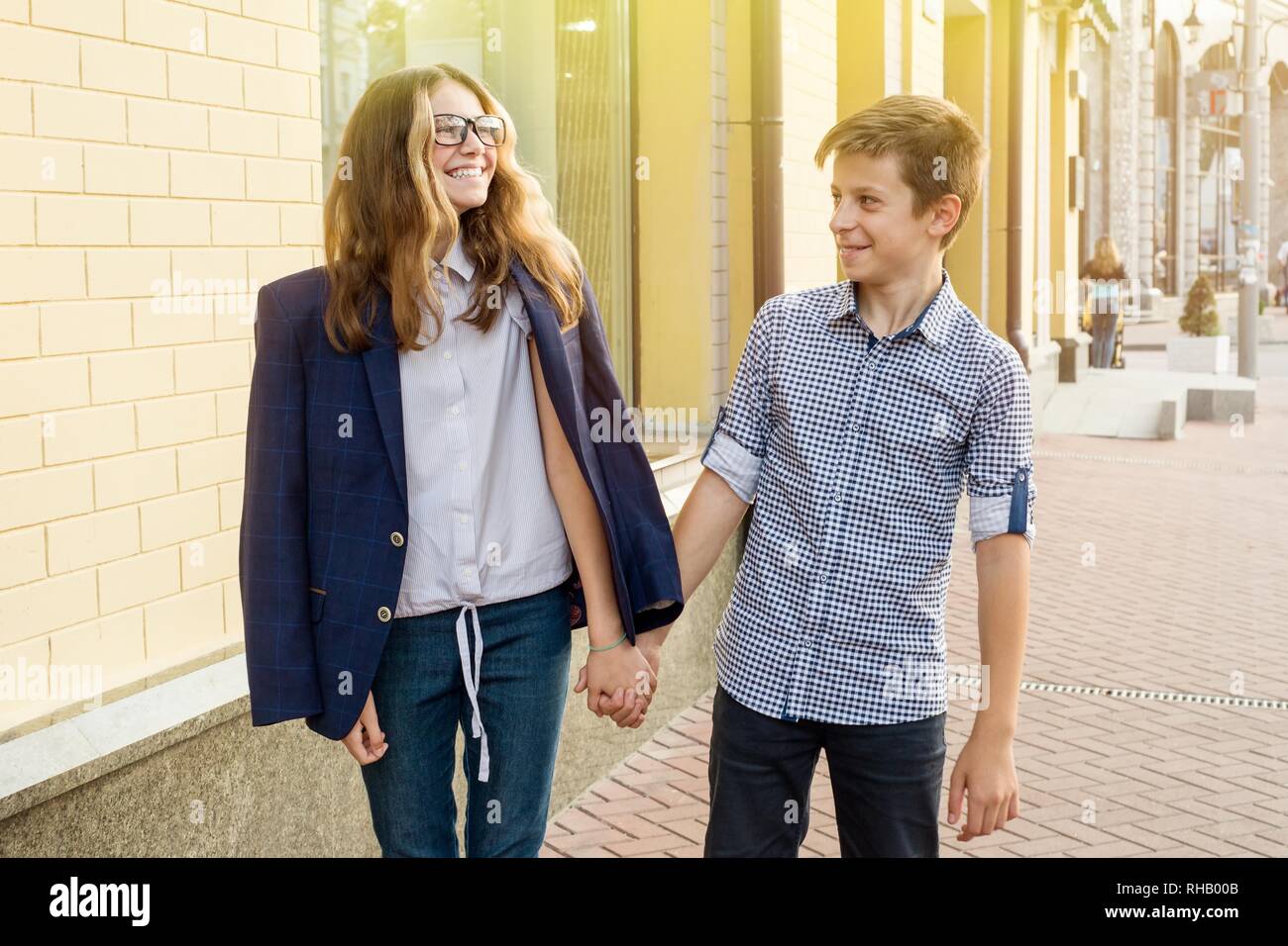 Cute teenage couple holding hands hi-res stock photography and images ...