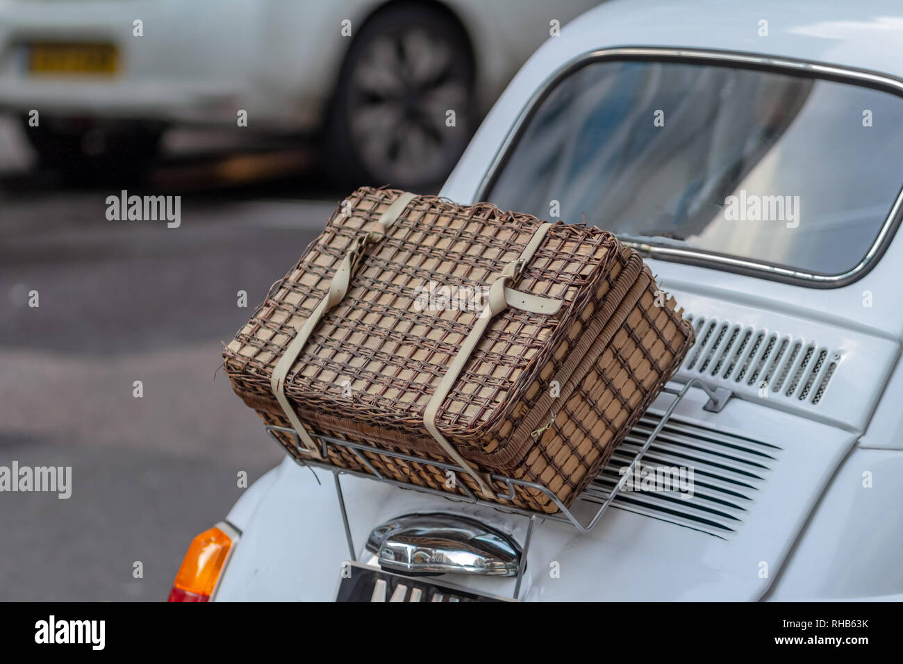 Handmade wicker picnic basket over white car boot Stock Photo Alamy