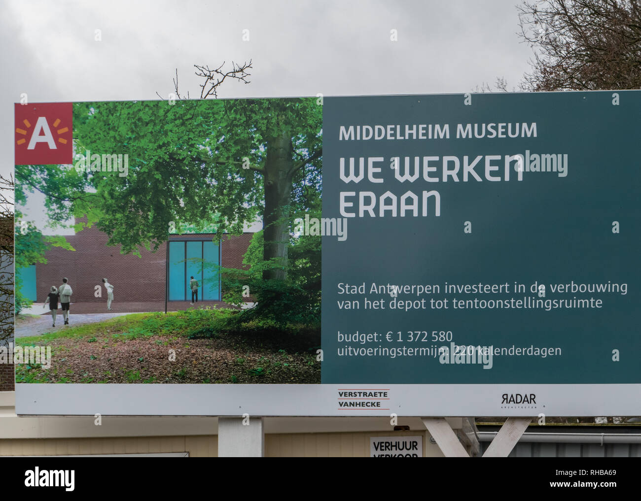 Construction sign reading ' we werken eraan ' in the Middelheim Park Museum in Antwerp, Belgium Stock Photo
