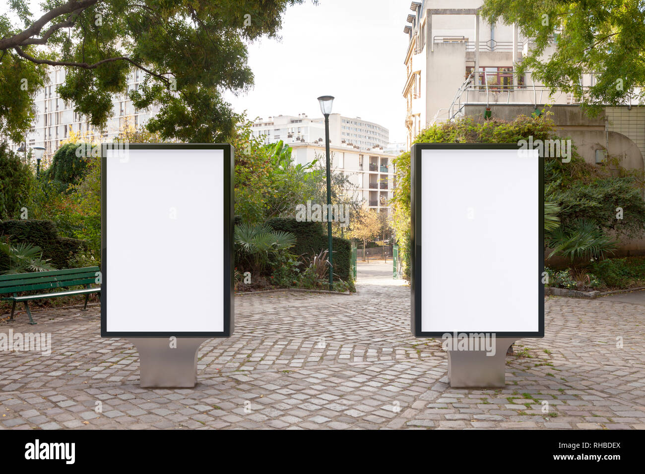 Blank street billboard poster stand in the park Stock Photo - Alamy