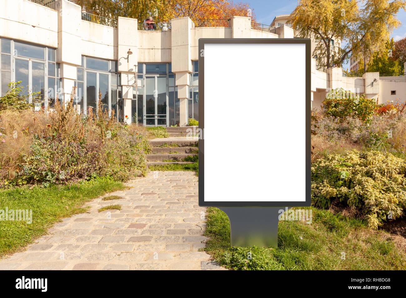 Blank street billboard poster stand in the park Stock Photo - Alamy