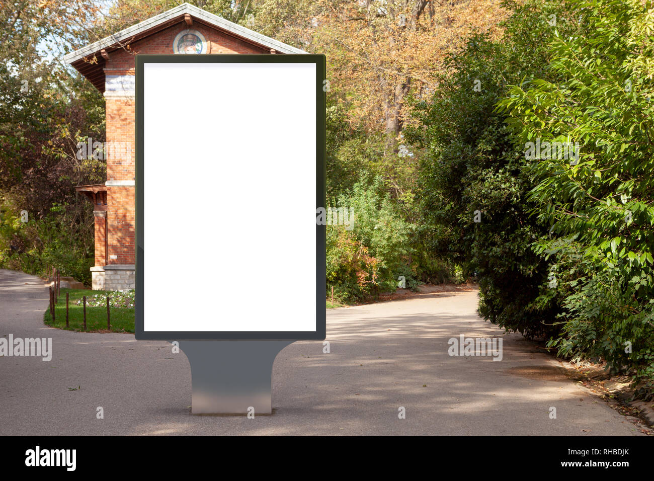 Blank street billboard poster stand in the park Stock Photo - Alamy