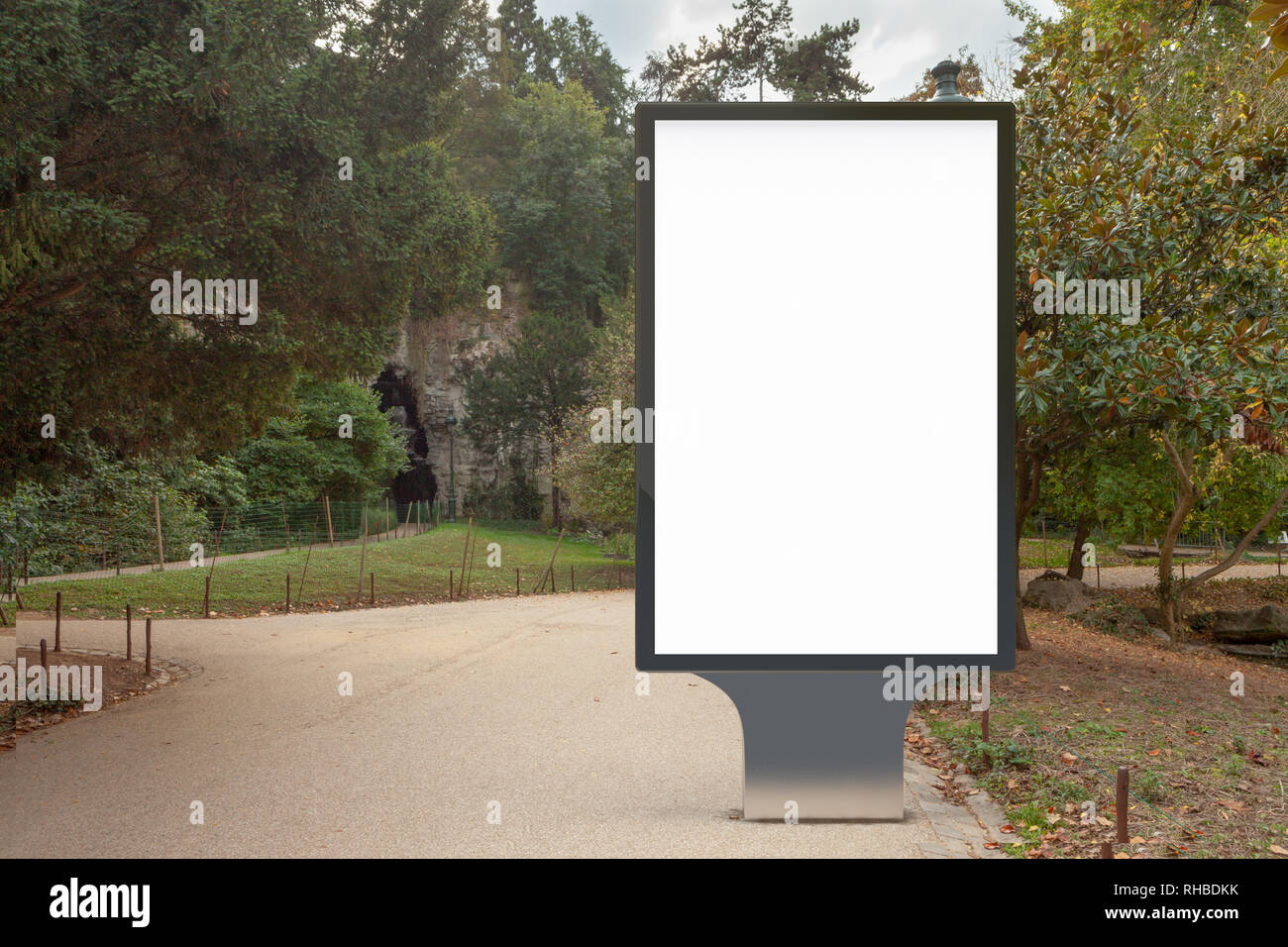 Blank street billboard poster stand in the park Stock Photo - Alamy