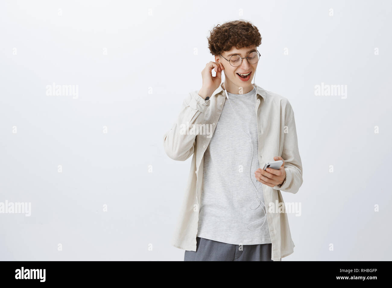 Excited And Satisfied Young Good Looking Hipster Guy In