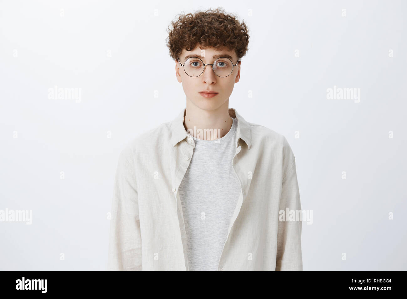 Waist Up Shot Of Young Attractive And Stylish Hipster Guy With