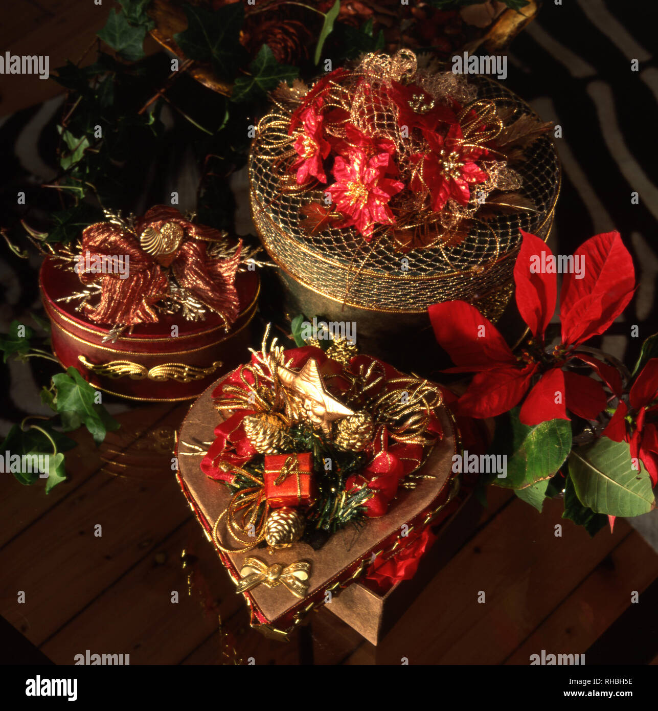 DECORATED GOLD CHRISTMAS GIFT BOXES AND BASKETS. Stock Photo