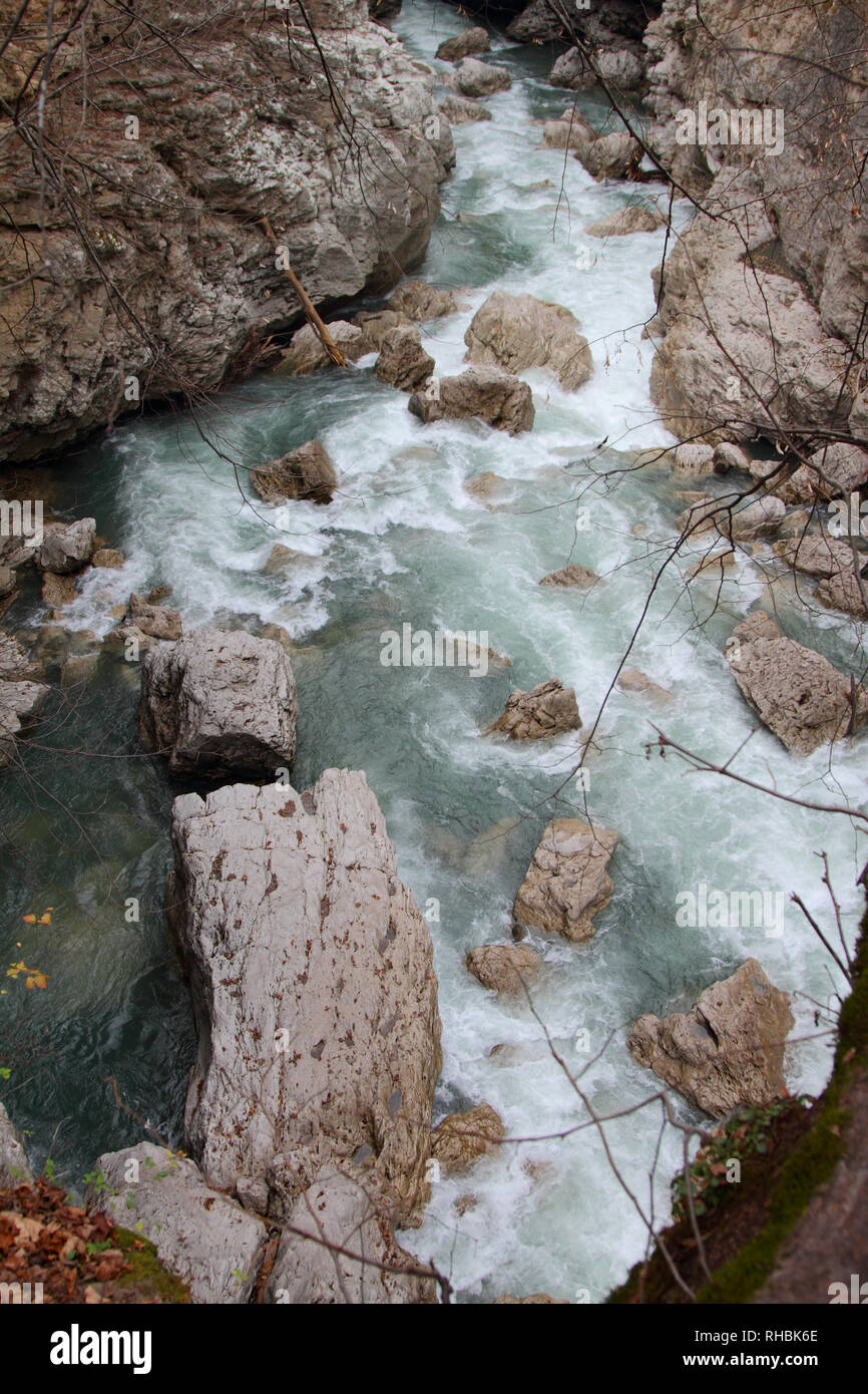 The mountain river flows among the boulders in the Khadzhokhskaya gorge. Adygea. Russia. Stock Photo