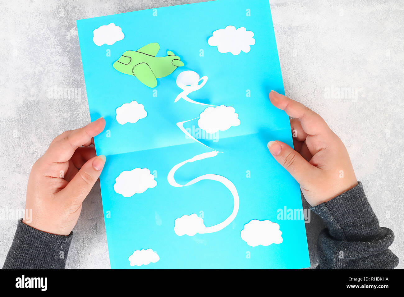 diy greeting card on february 23. a helicopter, a plane in