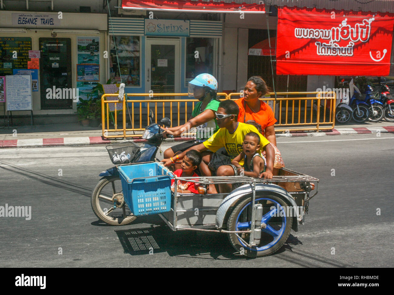 A family in a motorbike with side car, Phuket, Thailand Stock Photo