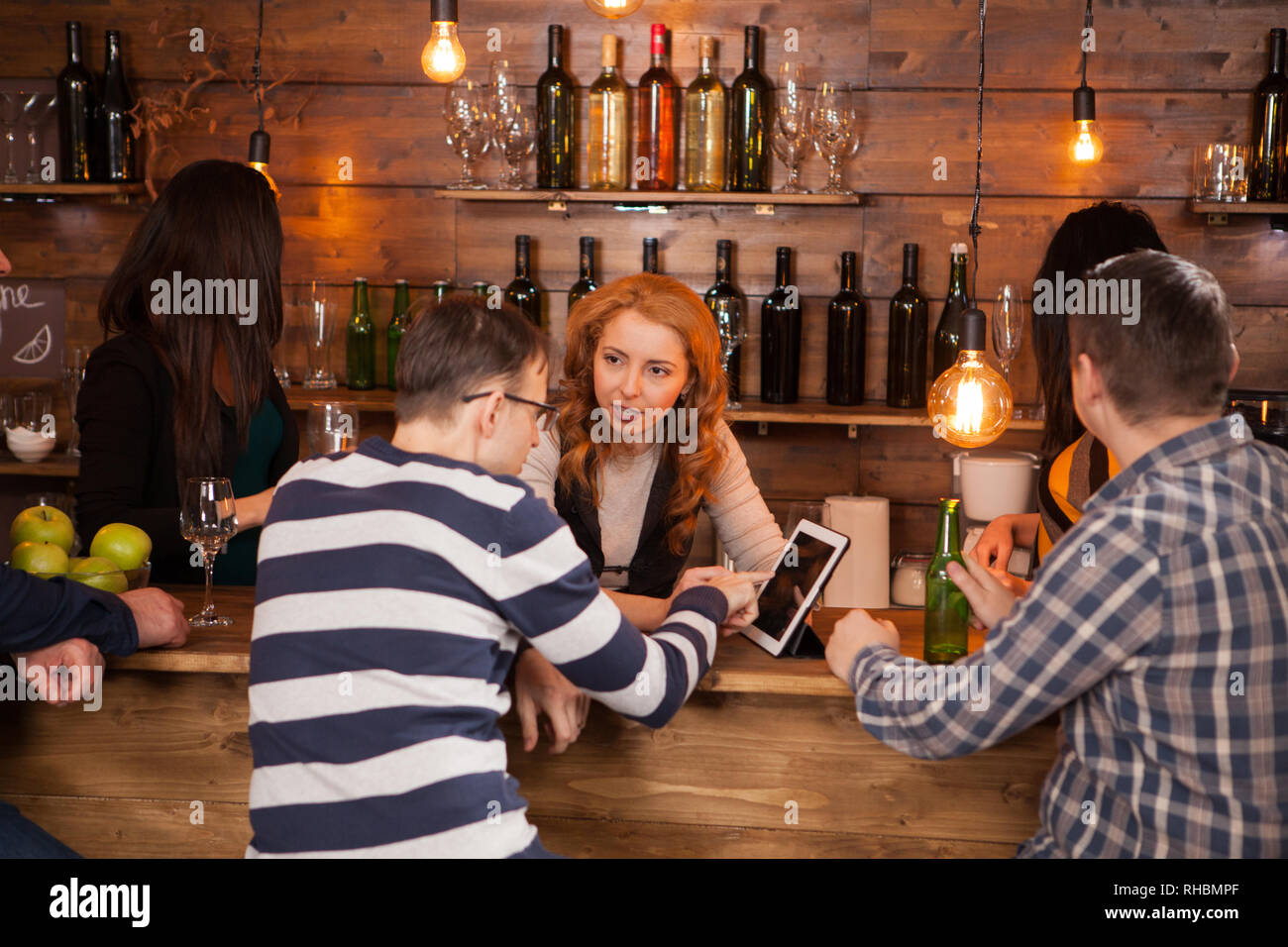 Man standing in irish bar hi-res stock photography and images - Alamy