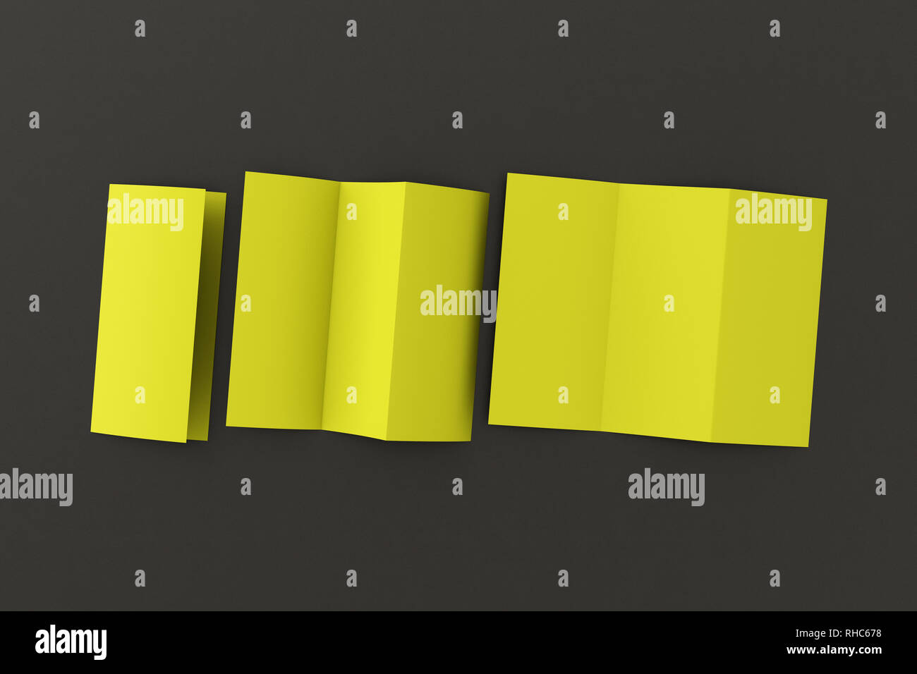 Blank yellow trifold paper leaflet on black background. Six pages ...