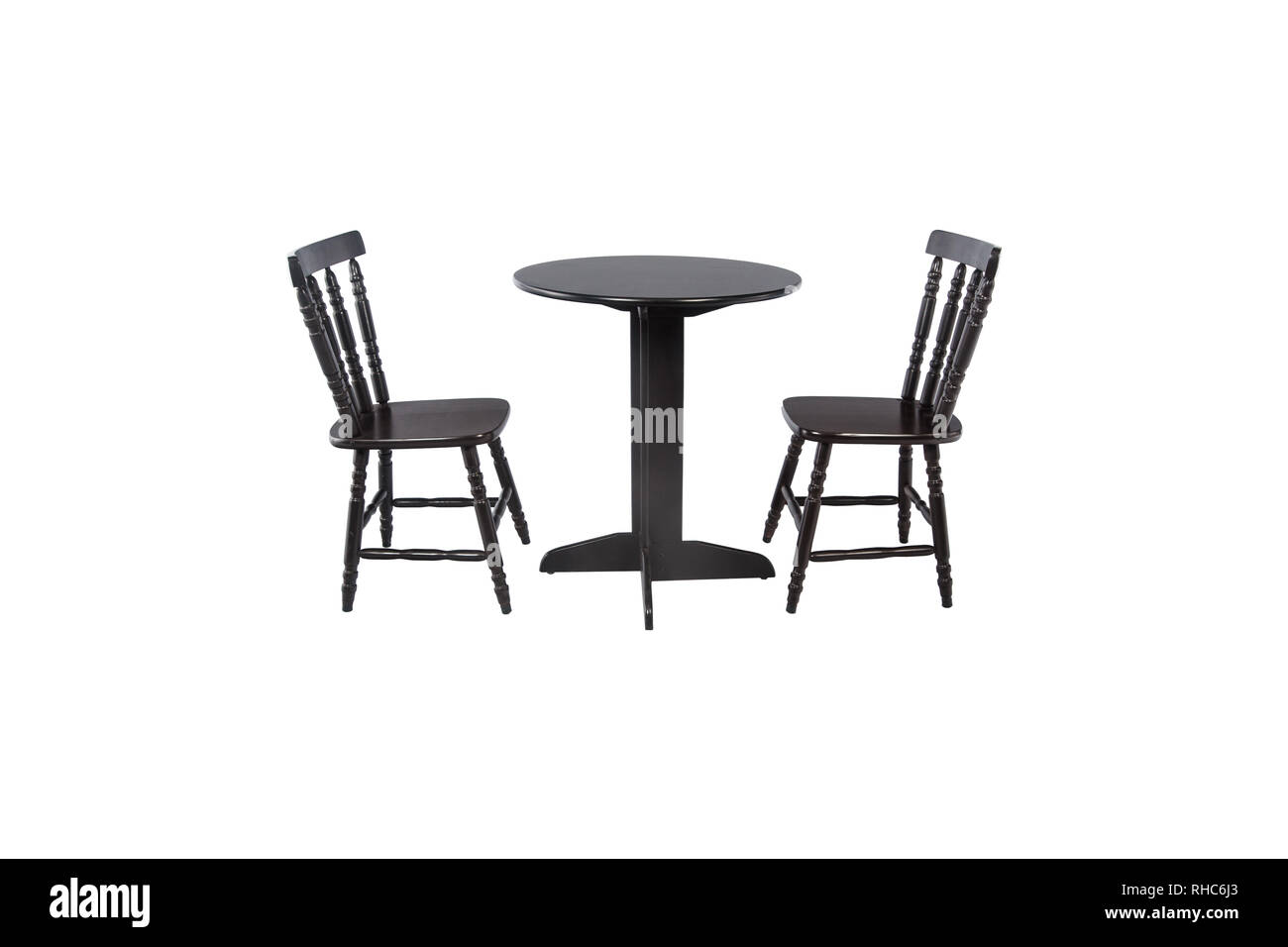 Outdoor wooden dining table with two stools on white background Stock