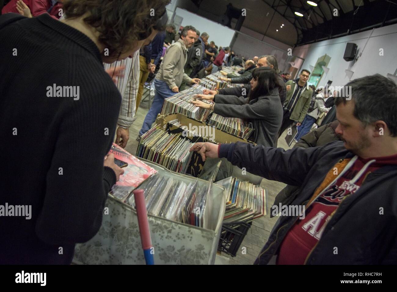 People seen searching for vinyl during the event. Vinyl Market is a festival with many new disc collections, many collectibles and new releases. It also has collections of other music themes, CDs, Posters, music magazines, books and many other related exhibits. Stock Photo