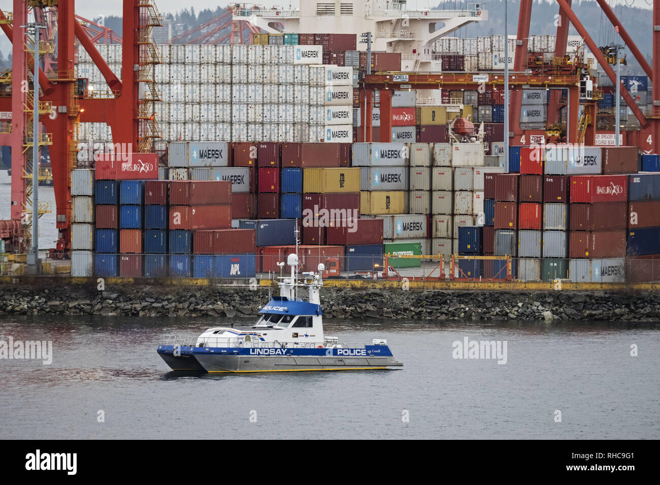 Vancouver, British Columbia, Canada. 18th Jan, 2019. The Royal Canadian Mounted Police (RCMP) patrol vessel ''Lindsay'' passes by the Port of Vancouver's Centerm container facility. The Port of Vancouver facility is operated by DP World Vancouver. Credit: Bayne Stanley/ZUMA Wire/Alamy Live News Stock Photo