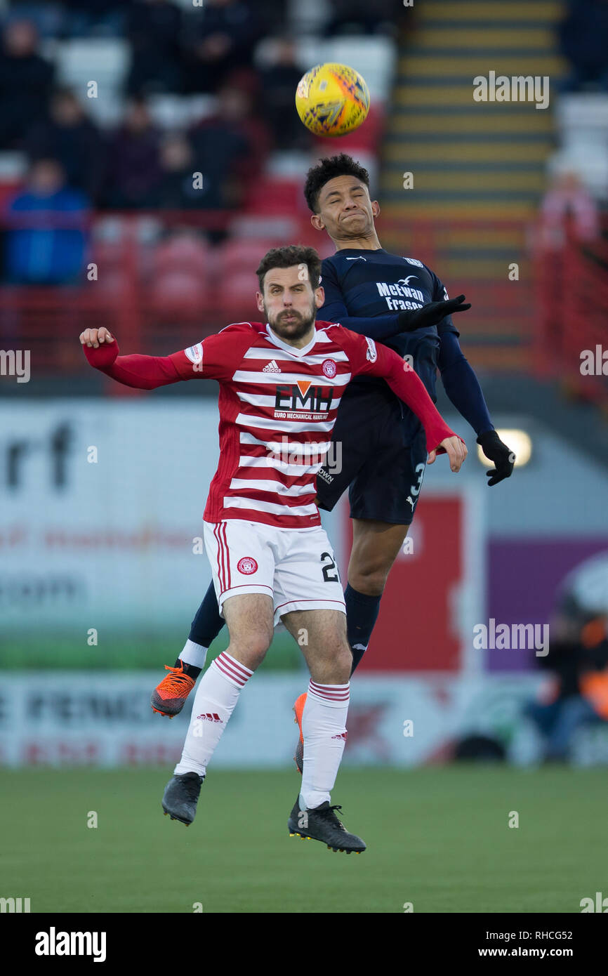 Hope CBD Stadium, Hamilton, UK. 2nd Feb, 2019. Ladbrokes Premiership football, Hamilton Academical versus Dundee; Nathan Ralph of Dundee competes in the air with Tony Andreu of Hamilton Academical Credit: Action Plus Sports/Alamy Live News Stock Photo