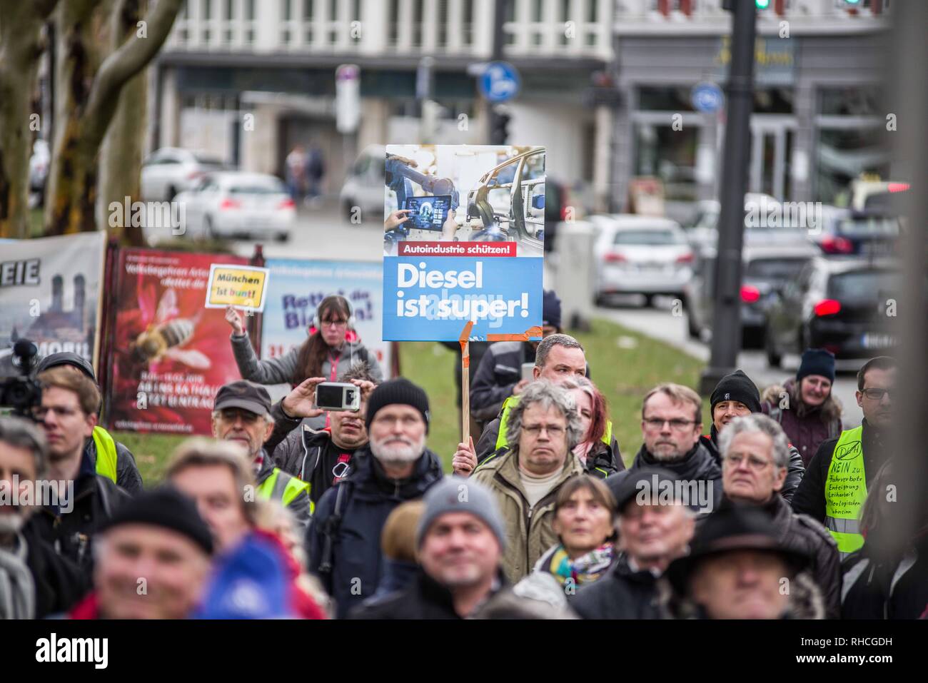 Munich, Bavaria, Germany. 2nd Feb, 2019. A poorly hidden sign from the far-right Alternative for Germany party was displayed at the demonstration. Responding to the prospect of diesel auto bans in major cities in Germany, protestors assembled at an air quality monitoring station in Munich's city center. Credit: ZUMA Press, Inc./Alamy Live News Stock Photo
