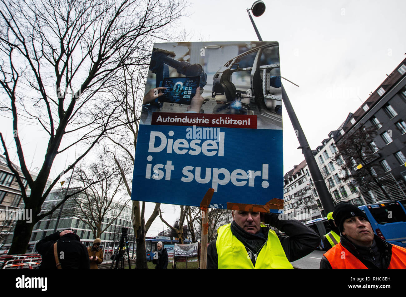 Munich, Bavaria, Germany. 2nd Feb, 2019. A poorly hidden sign from the far-right Alternative for Germany party was displayed at the demonstration. Responding to the prospect of diesel auto bans in major cities in Germany, protestors assembled at an air quality monitoring station in Munich's city center. Credit: ZUMA Press, Inc./Alamy Live News Stock Photo
