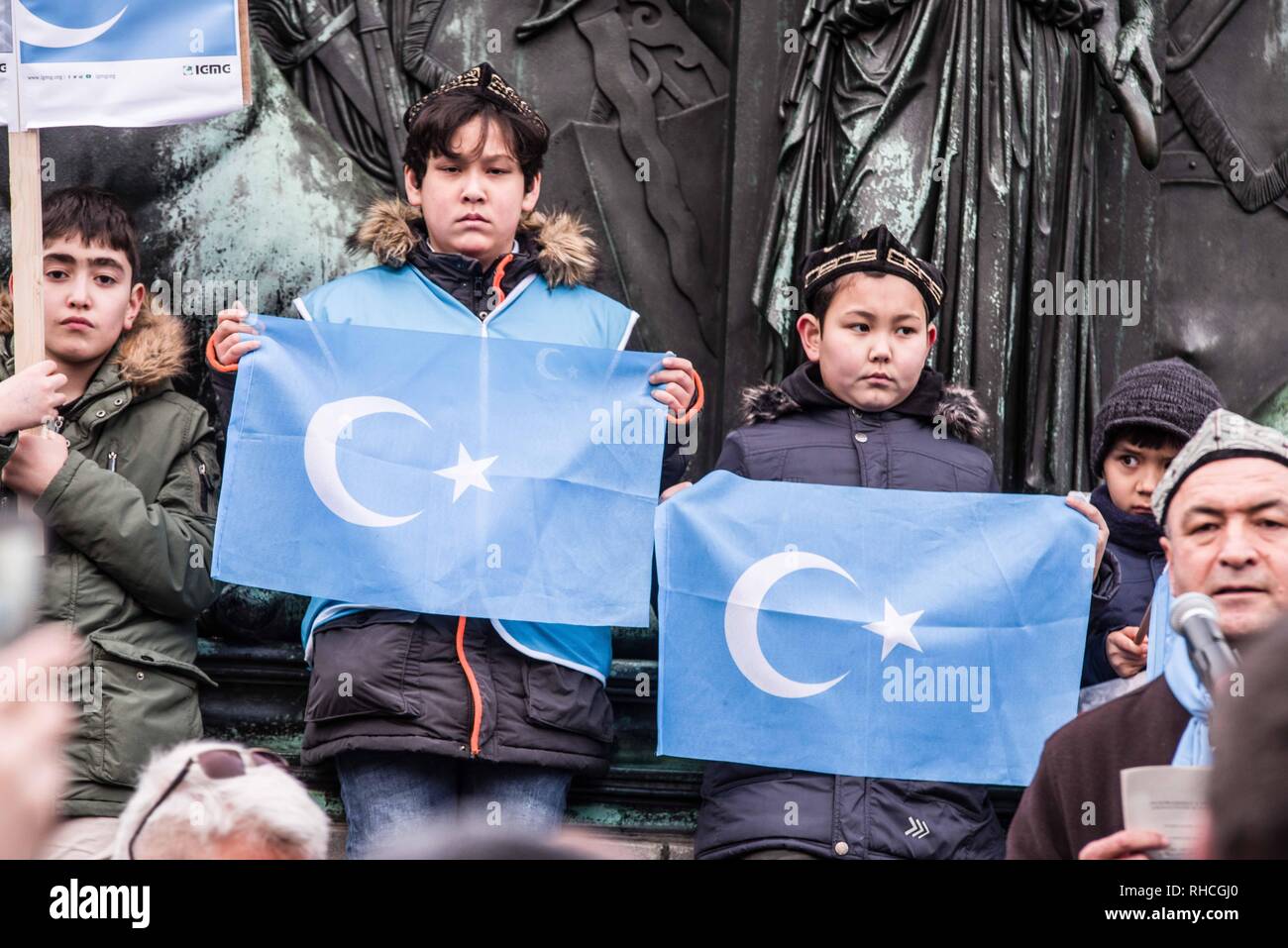 Munich, Bavaria, Germany. 2nd Feb, 2019. Uyghur children in Germany protesting with the flag of East Turkestan, which is also known as the Xinjiang Autonomous Province. to protest against the so-called 'Muslim Crackdown'' by the Chinese Communist Party in the Xinjiang Autonomous Region of China. The region is contains roughly 26 million people, 11 million of whom are the ethnically Turkic Uyghurs who still call the region East Turkistan . The CCP has placed upwards of 1 million Uyghurs in reeducation ca Credit: ZU Credit: ZUMA Press, Inc./Alamy Live News Stock Photo