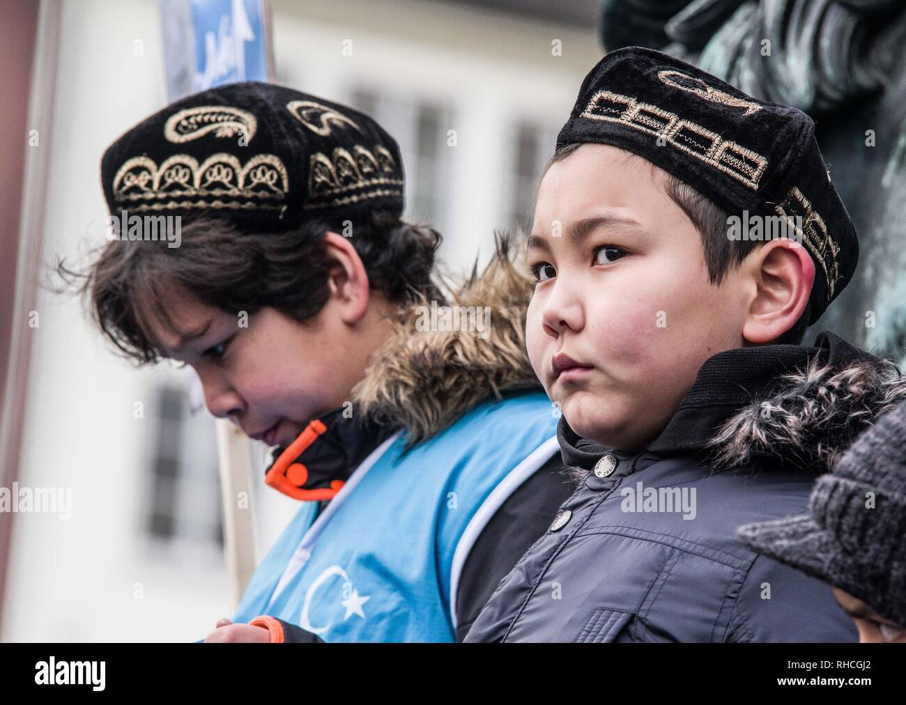 Munich, Bavaria, Germany. 2nd Feb, 2019. Uyghur children in Germany protesting with the flag of East Turkestan, which is also known as the Xinjiang Autonomous Province. to protest against the so-called 'Muslim Crackdown'' by the Chinese Communist Party in the Xinjiang Autonomous Region of China. The region is contains roughly 26 million people, 11 million of whom are the ethnically Turkic Uyghurs who still call the region East Turkistan . The CCP has placed upwards of 1 million Uyghurs in reeducation ca Credit: ZU Credit: ZUMA Press, Inc./Alamy Live News Stock Photo