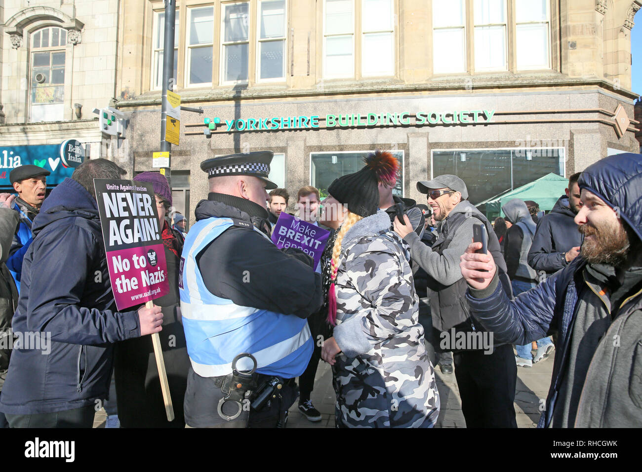 Manchester, UK. 2nd February 2019. Stand up to racism campaigners face hostility from right wing protesters.  The anti racists called for solidarity at the 'reclaim out city event' but faced abuse from members of the right wing 'yellow vest' UK movement with police having to prevent a breach of the peace, Piccadilly Gardens,  Manchester, UK, 2nd February 2019 (C)Barbara Cook/Alamy Live News Credit: Barbara Cook/Alamy Live News Stock Photo