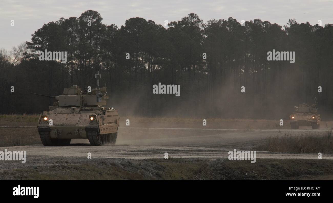 Bradley Fighting Vehicles crewed by Soldiers assigned to 2nd Battalion