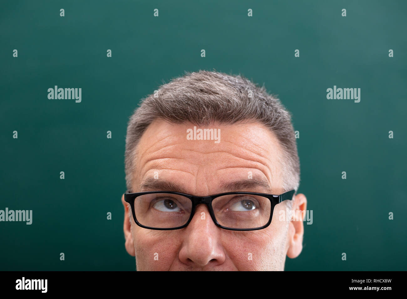 Old man thinking studio hi-res stock photography and images - Alamy