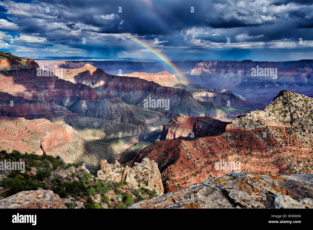 thunderstorm and rainbow over Grand Canyon, Cape Royal viewpoint, Arizona, USA Stock Photo