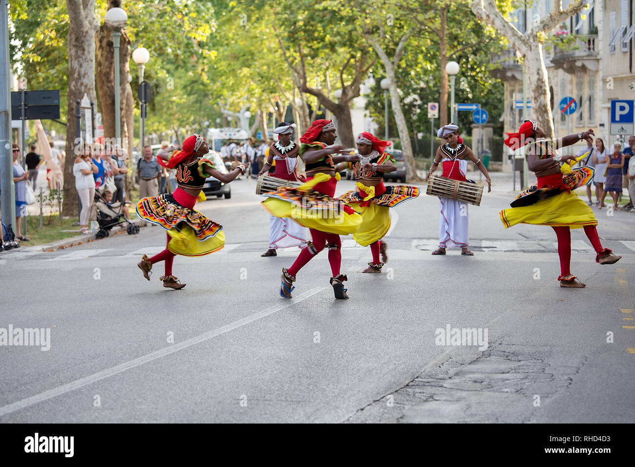 Gorizia, Italy - August 27, 2017: Dancers of Sri Lanka traditional dance company on the town street during the International Folklore Festival Stock Photo