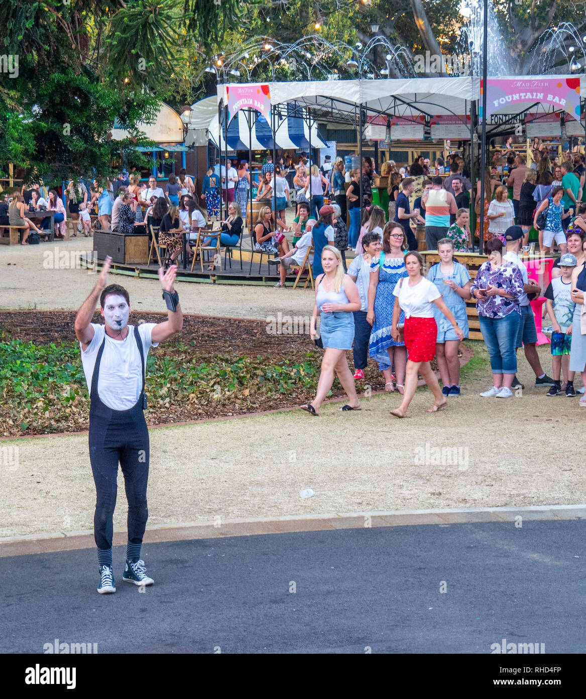 A mime artist performing in front of a crowd at Fringe World Festival