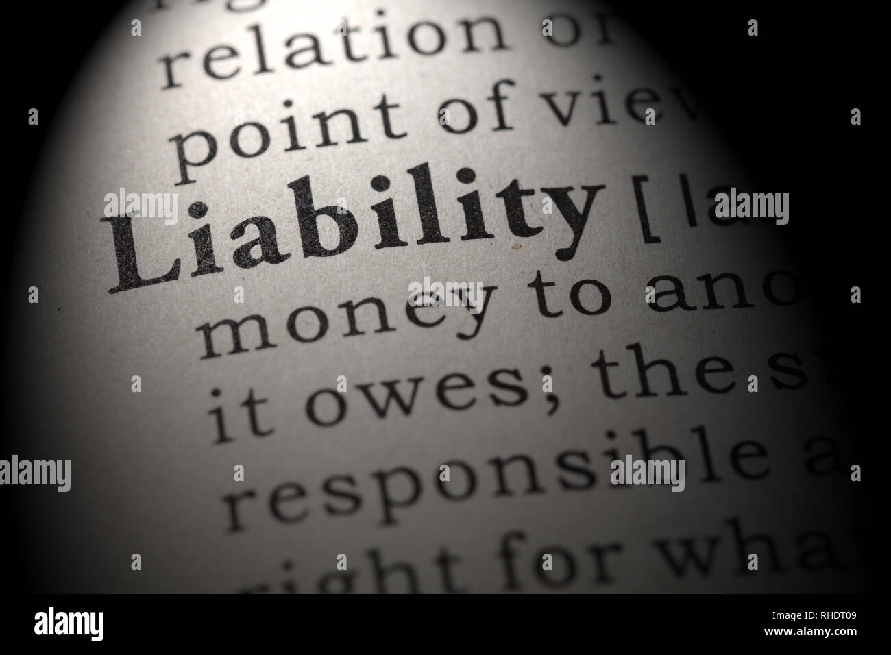 Fake Dictionary, Dictionary definition of the word liability. including key descriptive words. Stock Photo