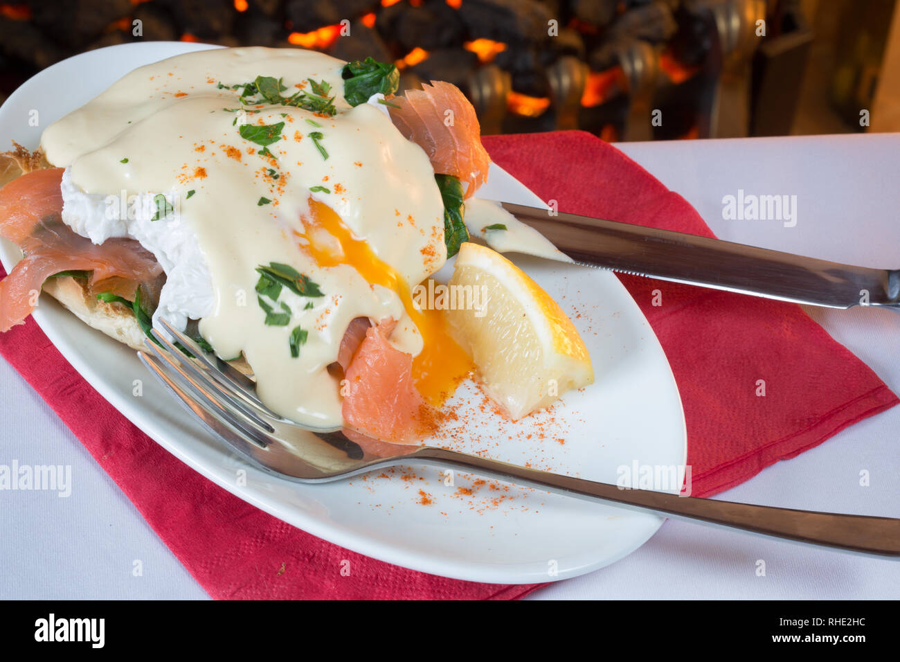 A plate of Eggs Benedict served for breakfast Stock Photo