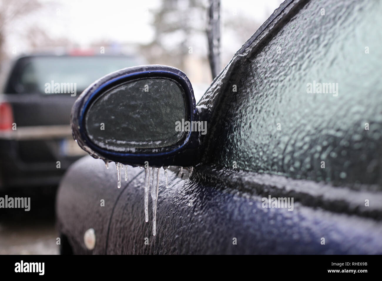 Car frozen side mirror after a freezing rain phenomenon Stock Photo Alamy