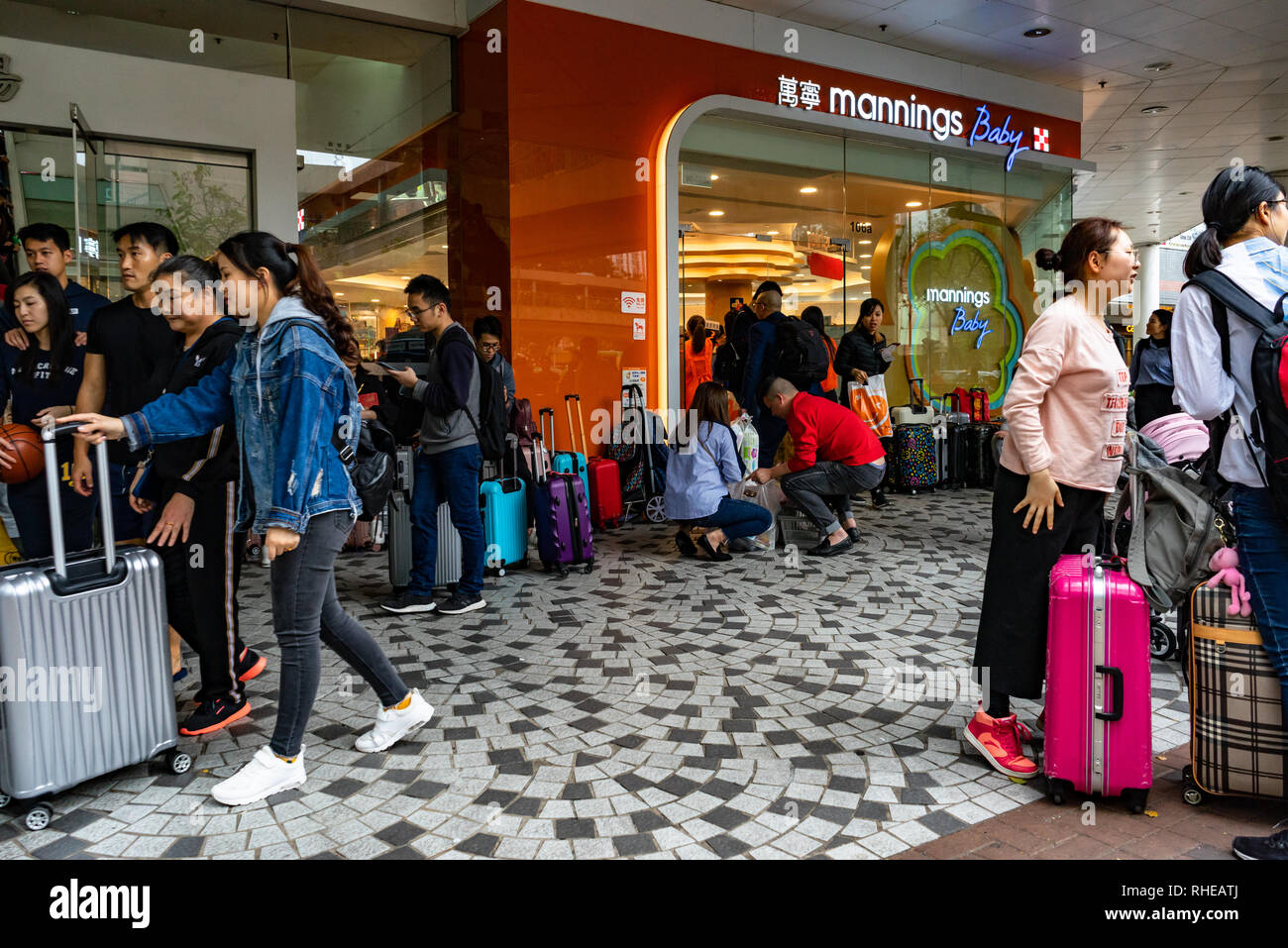 Chinese parallel traders buy taxfree goods in Hong Kong for resale in