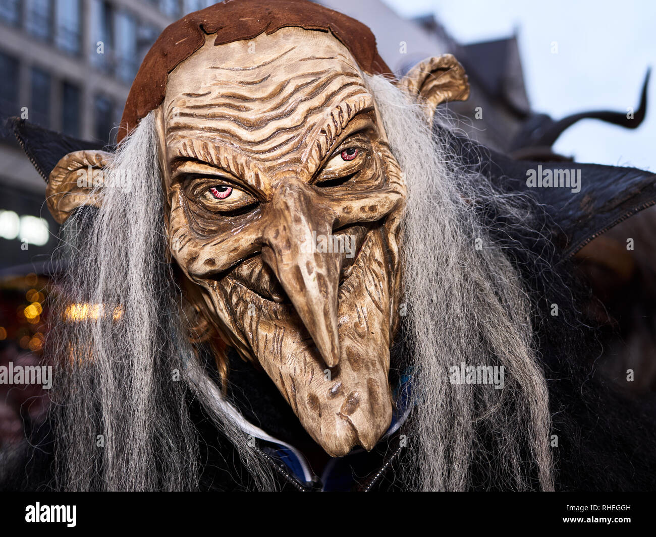 Krampus from Munich December 2018. This a devil masks made from wooden to scare people and espacially children, which from legend they tend to eat. Stock Photo