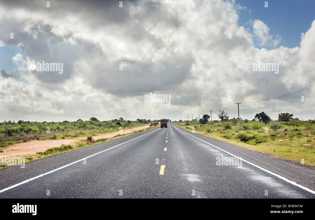 African highway from Mombasa to Nairobi in Kenya, straight asphalt road