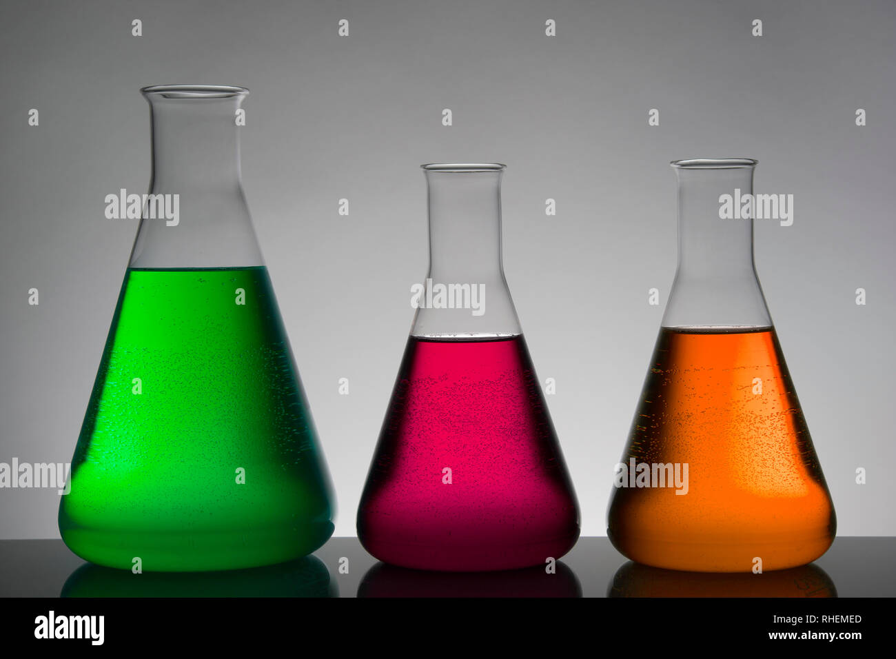 Liquid in laboratory bottles. Scientific biochemical laboratory ...