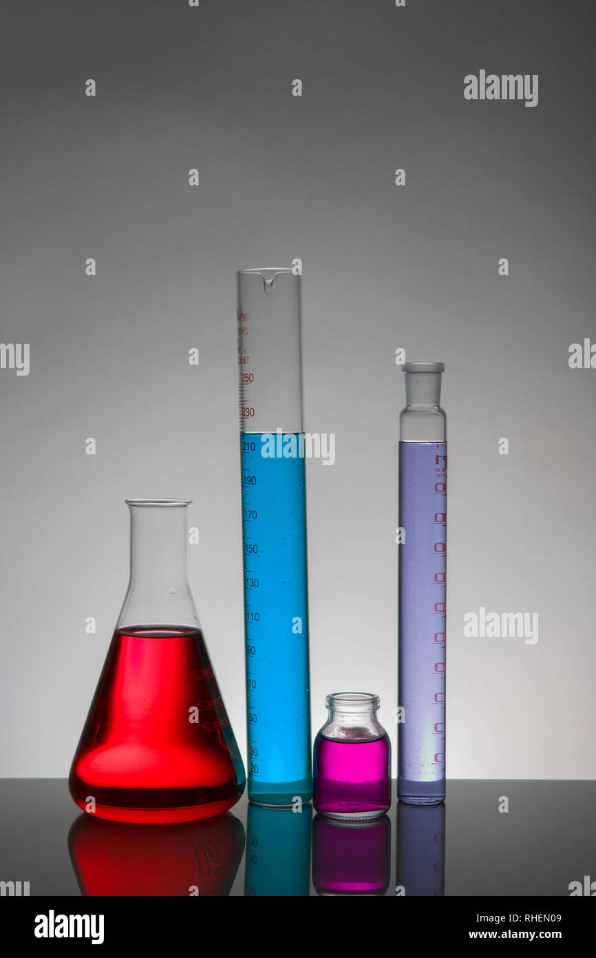 Liquid in laboratory bottles. Scientific biochemical laboratory