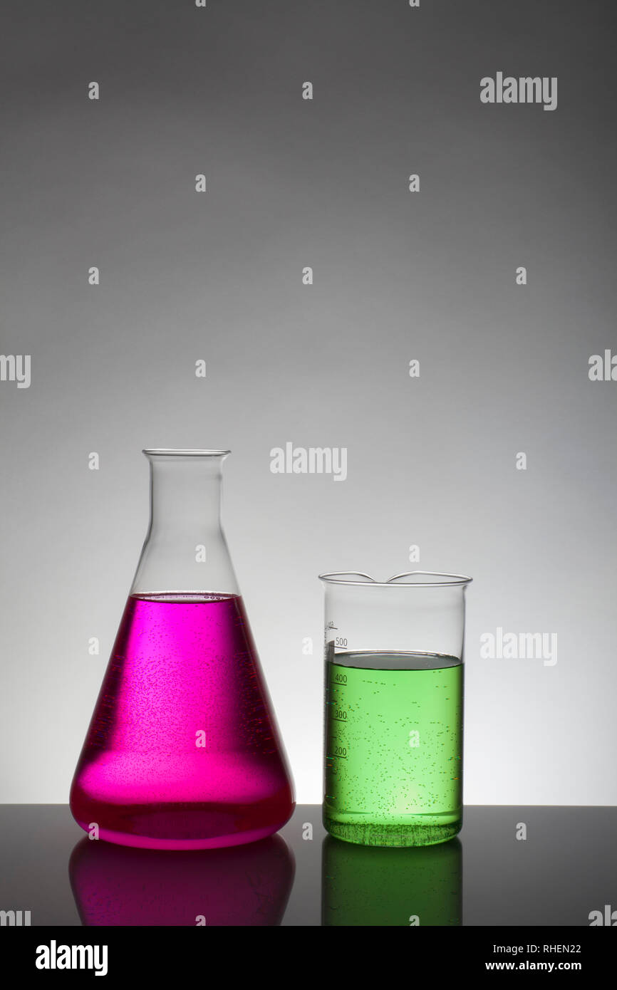 Liquid in laboratory bottles. Scientific biochemical laboratory ...